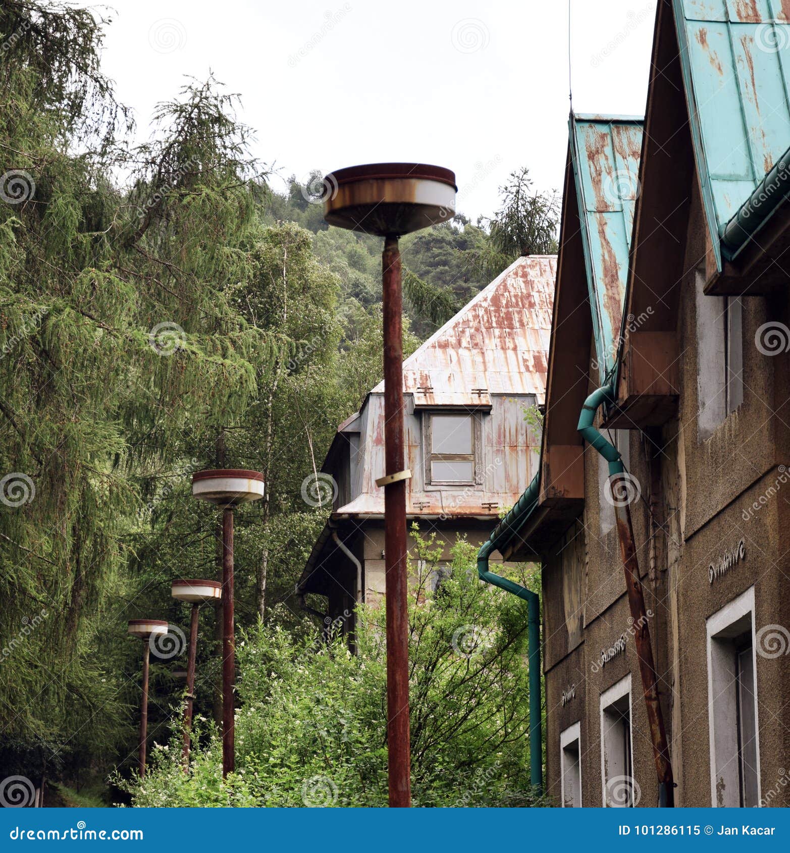 former accomodation resort with rusty old lamps